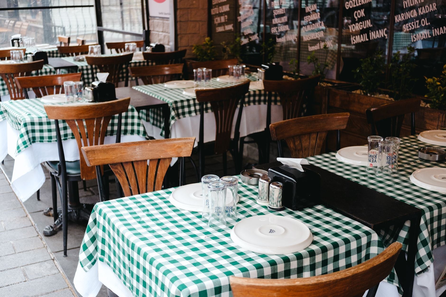 Empty cafe tables ready for service