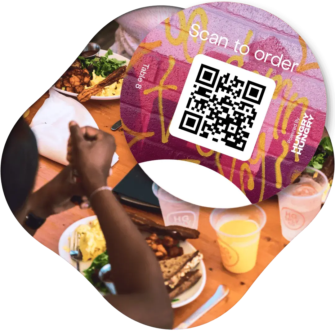 A table sticker with a QR code reading 